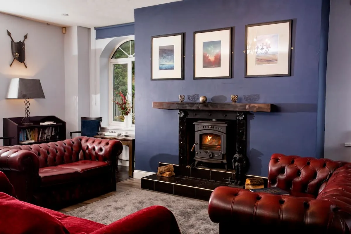 Cosy fireplace in the lounge at Donegal Manor