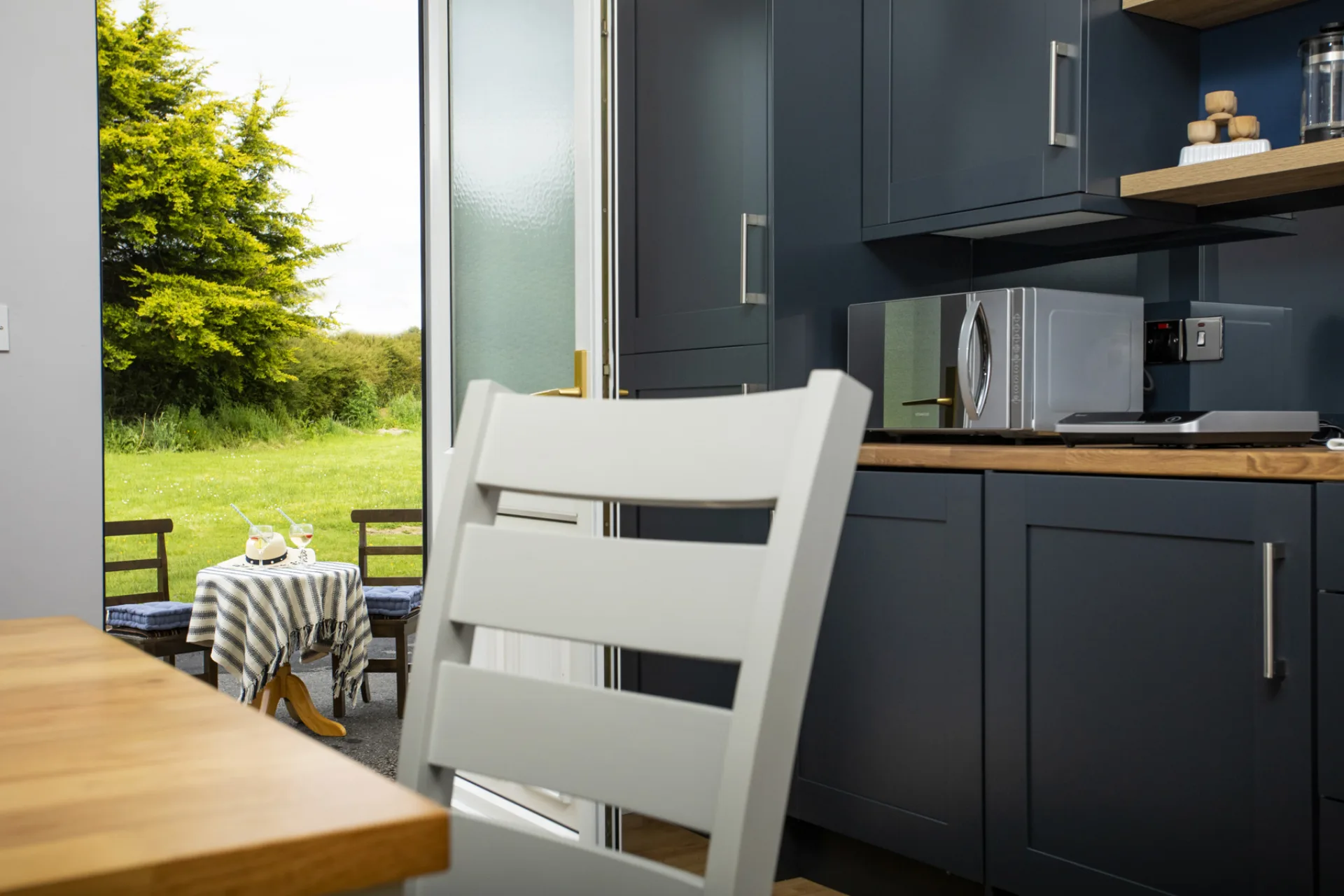 The Residence Suite kitchen with garden view at Donegal Manor